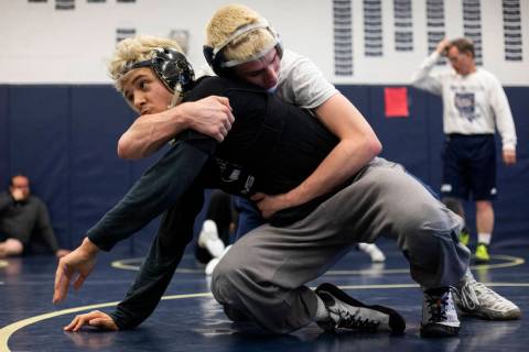 Senior Weston Presser, top, wrestles against senior Matt Van Riel, bottom, during the last prac ...