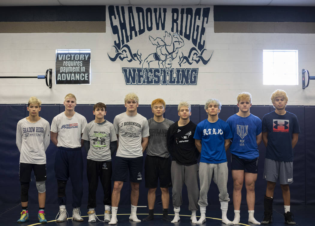 The nine wrestlers that will compete in the class 4A state championship from Shadow Ridge High ...