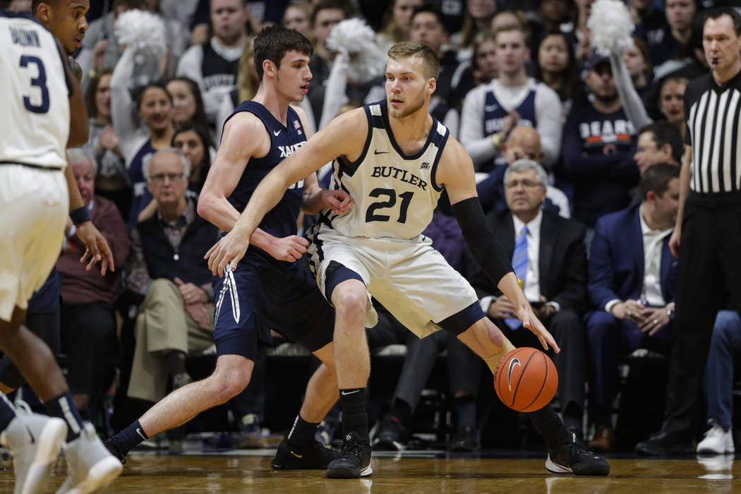 Xavier forward Zach Freemantle (32) defends Butler center Derrik Smits (21) in the second half ...