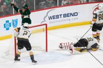 Minnesota Wild's Joel Eriksson Ek, top left, celebrates his power play goal off Vegas Golden Kn ...