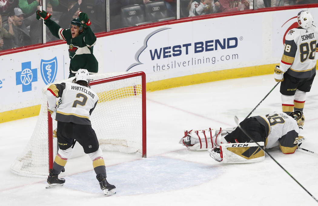 Minnesota Wild's Joel Eriksson Ek, top left, celebrates his power play goal off Vegas Golden Kn ...