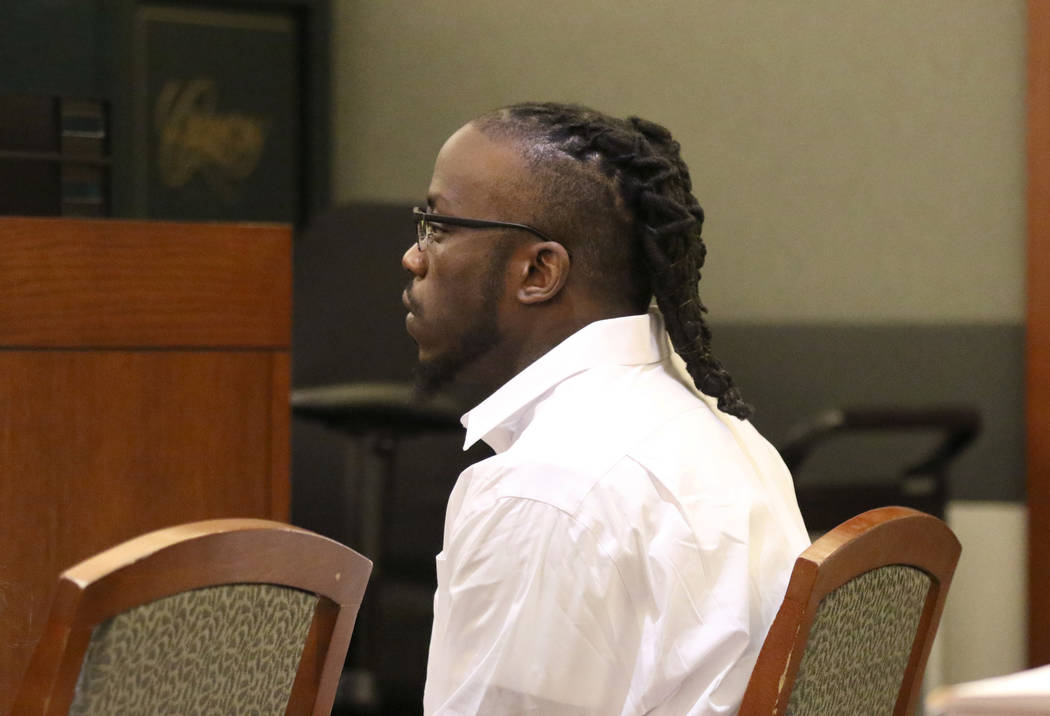 Durwin Allen, charged in the killings of Myron Manghum, 33, and Alyssa Velasco, 27, listens as ...