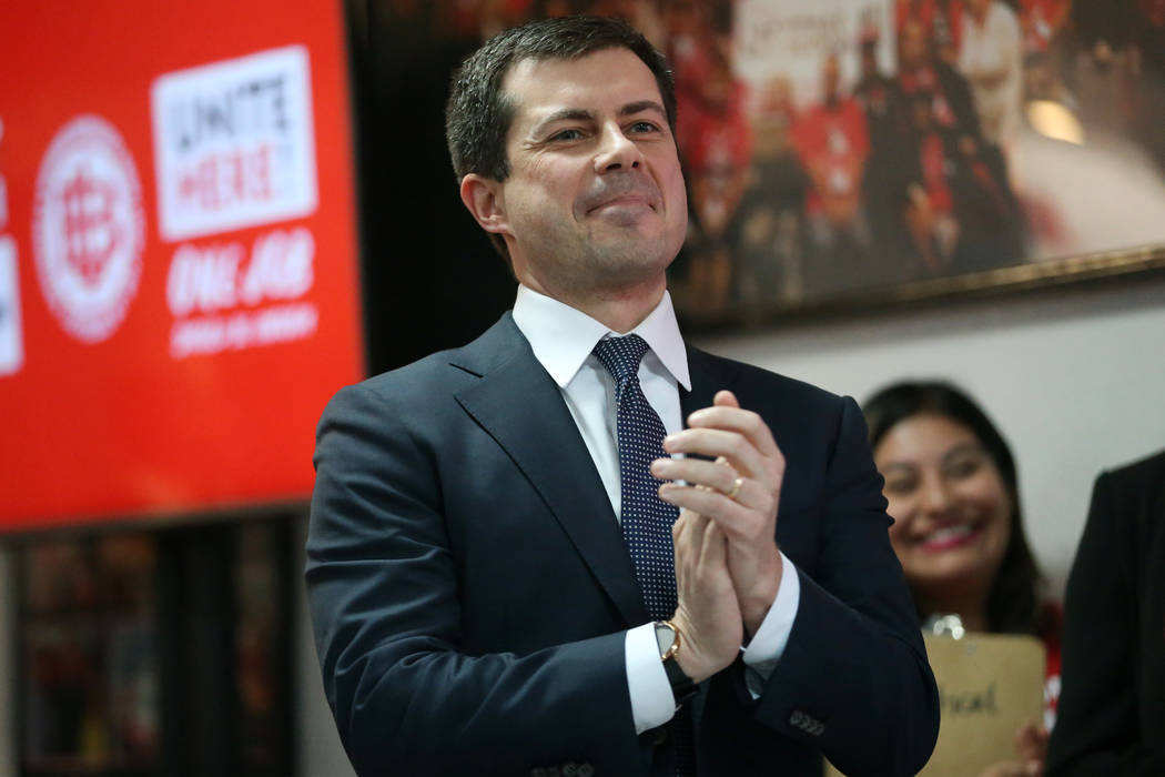 Democratic presidential candidate Pete Buttigieg gets ready to take the stage for a town hall e ...