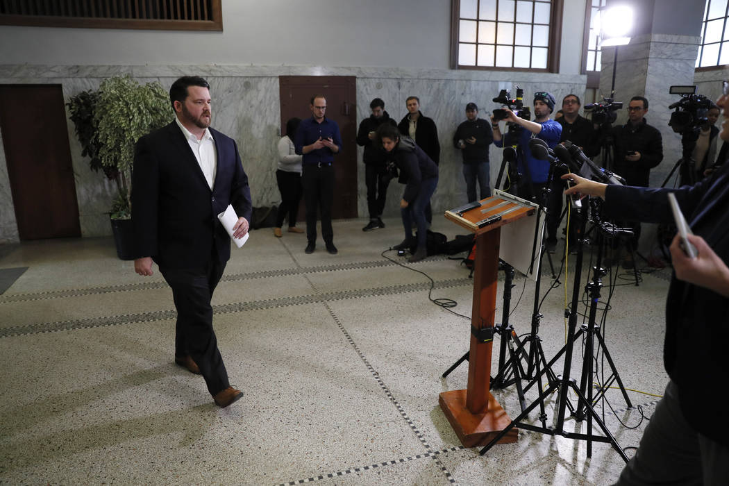 Iowa Democratic Party chairman Troy Price arrives to speak to members of the media during a new ...