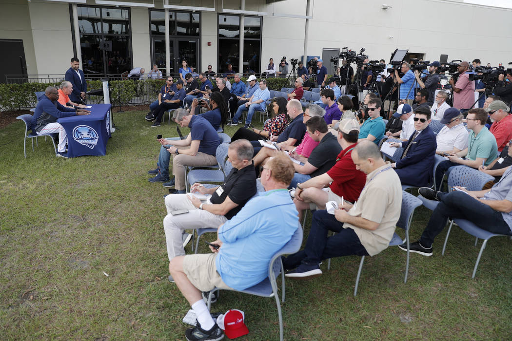 Houston Astros manager Dusty Baker, left, and owner Jim Crane speak during a news conference be ...