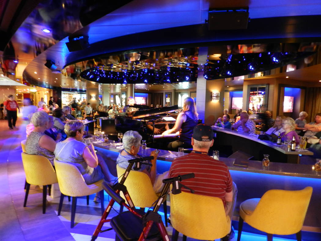 Passengers are seen on the MS Westerdam during a cruise. The vessel was turned away from at lea ...