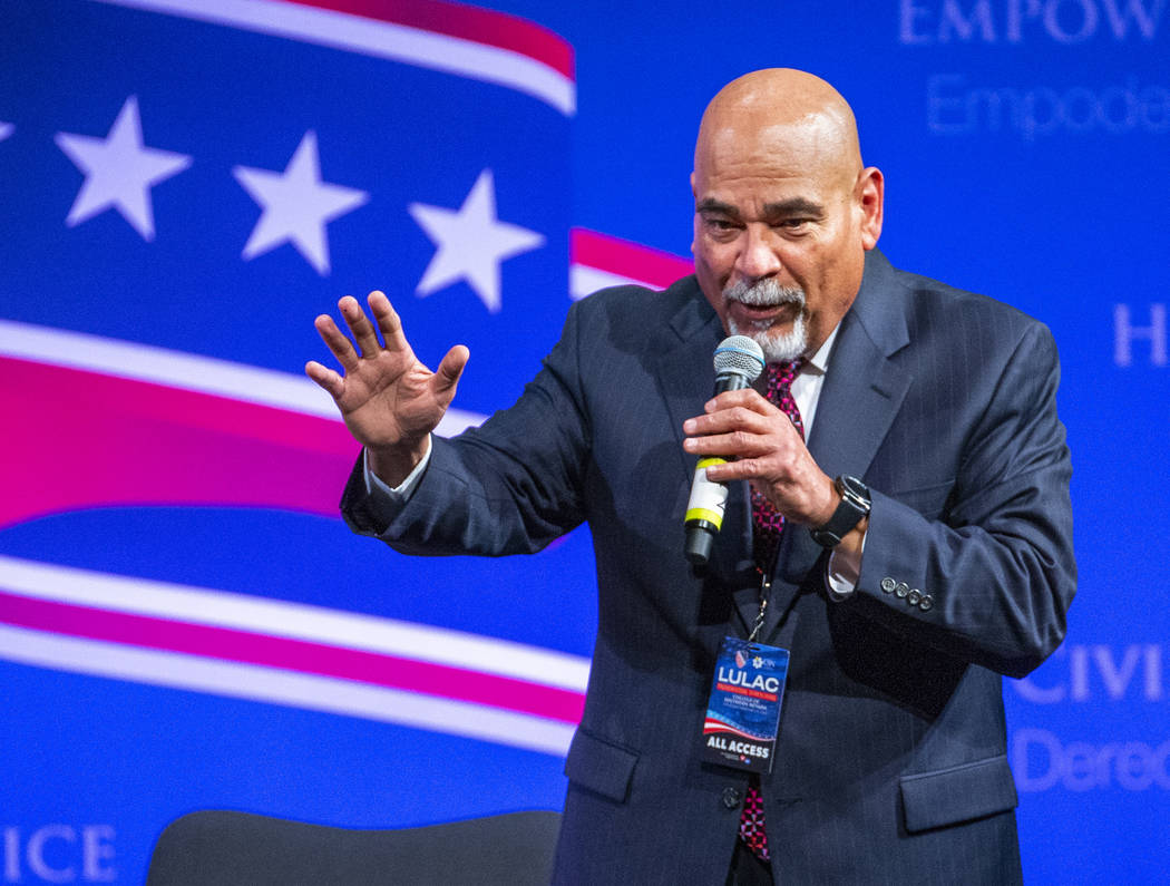 Communications director David Cruz for the League of United Latin American Citizens speaks duri ...