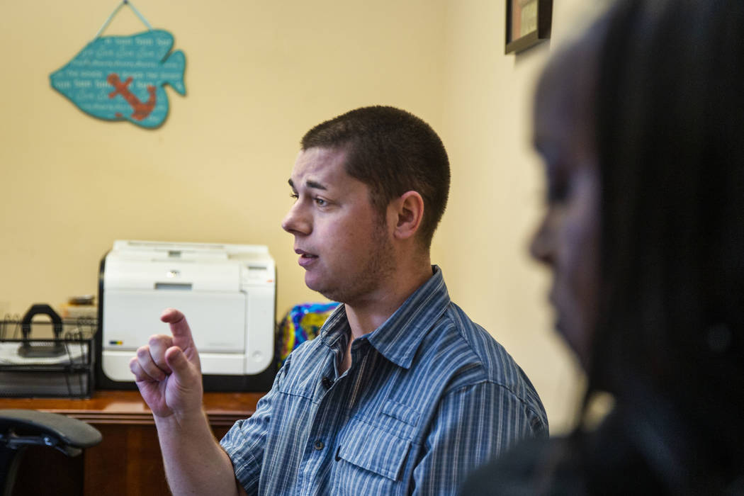 Joshua Domsky talks beside counselor Kairo Henderson about the progress he has made as a patien ...