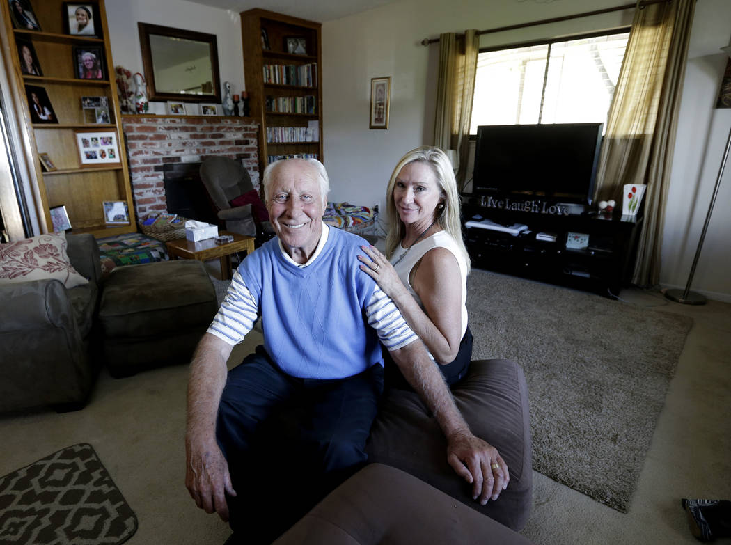 In this July 23, 2015 file photo, NFL Hall of Famer Fred Biletnikoff and his wife, Angela, pose ...