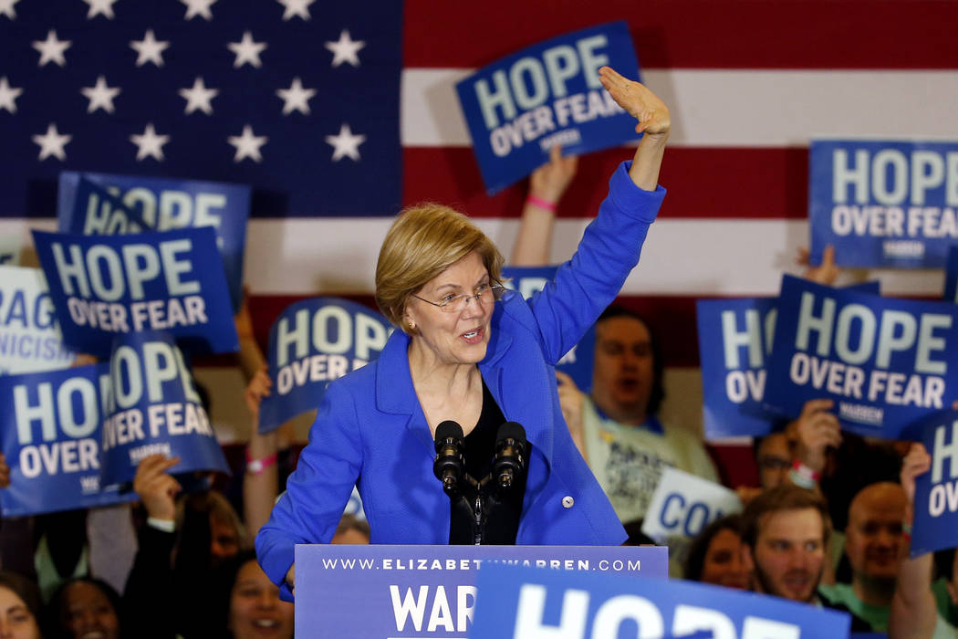 Democratic presidential candidate Sen. Elizabeth Warren, D-Mass., speaks to supporters at a cau ...