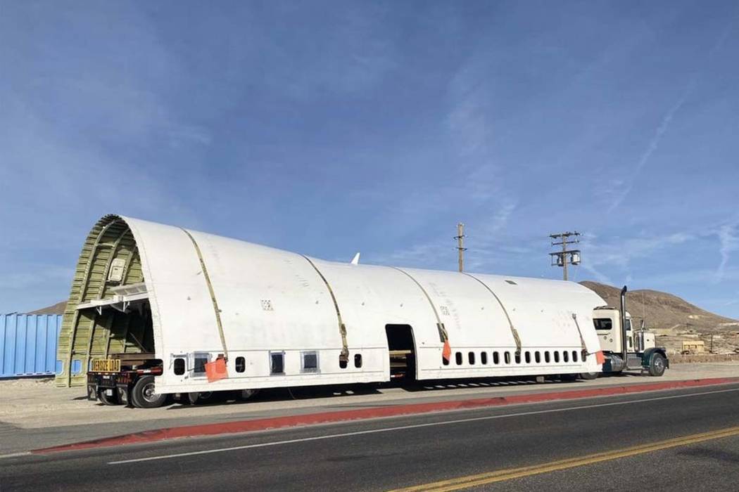 Part of the fuselage of a Boeing 747 used in Burning Man makes a pit stop in Tonopah, en route ...