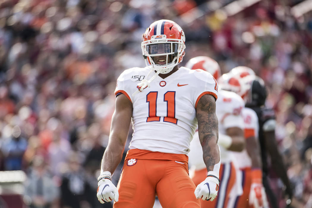 FILE - In this Nov. 30, 2019, file photo, Clemson linebacker Isaiah Simmons (11) celebrates a s ...
