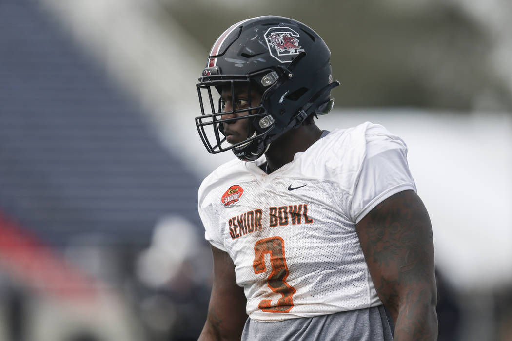 South Carolina's Javon Kinlaw lines up for a play as the South squad runs drills during practic ...