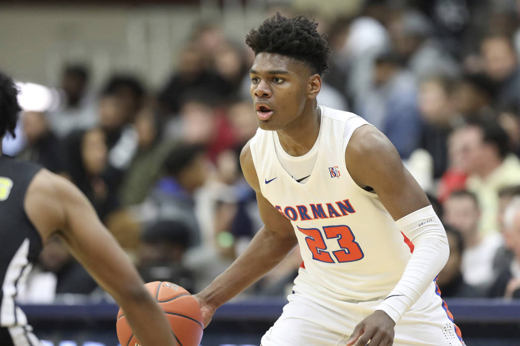 Bishop Gorman's Mwani Wilkinson #23 in action against Roselle Catholic during a high school bas ...