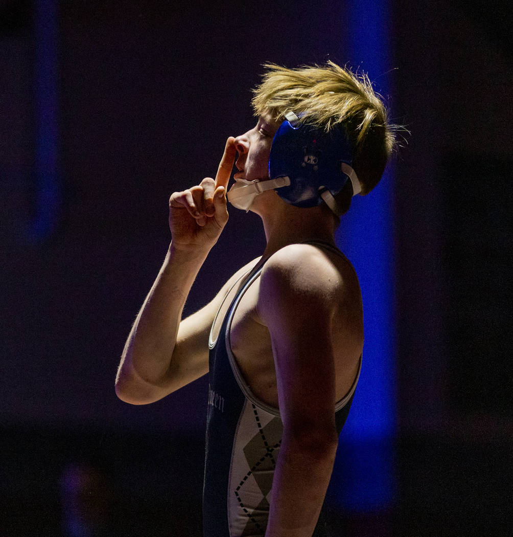 McQueen's Ben Miller quietly celebrates his win over Bishop Manogue's Carter Tate in the 106 po ...