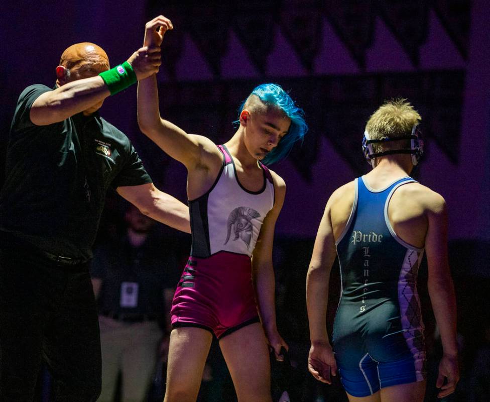 Cimarron-Memorial's Otto Cate-Cribari, left, defeats McQueen's Preston Harn in their 120 pound ...