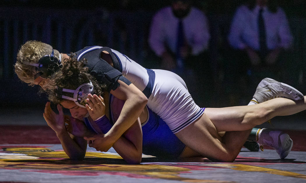 Shadow Ridge's Matthew Van Riel, top, dominates Spanish Spring's Devin Griffin in their 126 pou ...