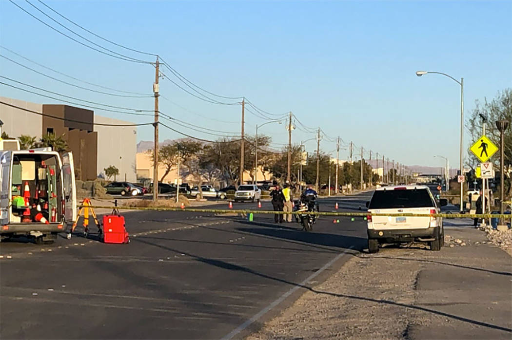 North Las Vegas police investigate after a crash at Lone Mountain and Losee roads in North Las ...