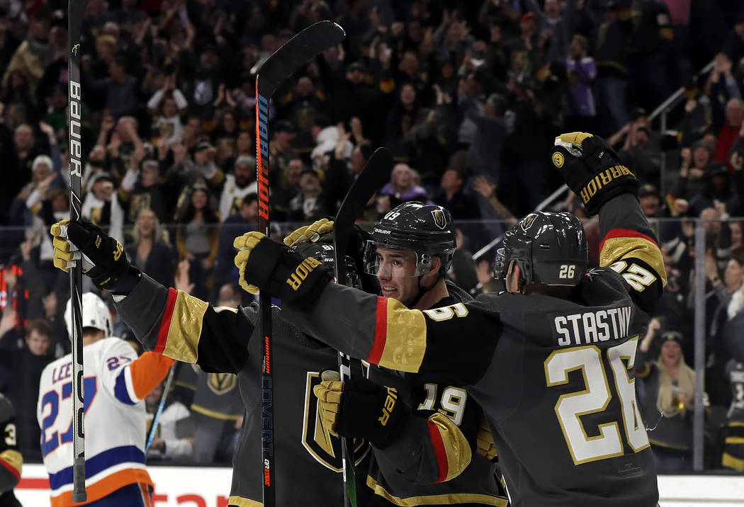 Vegas Golden Knights right wing Reilly Smith (19) celebrates after scoring against the New York ...