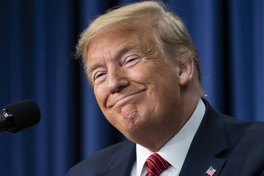 President Donald Trump smiles as he speaks to members of the National Border Patrol Council at ...