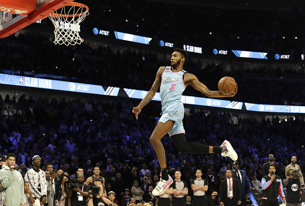 Miami Heat's Derrick Jones Jr. heads to the basket during the NBA All-Star slam dunk contest in ...