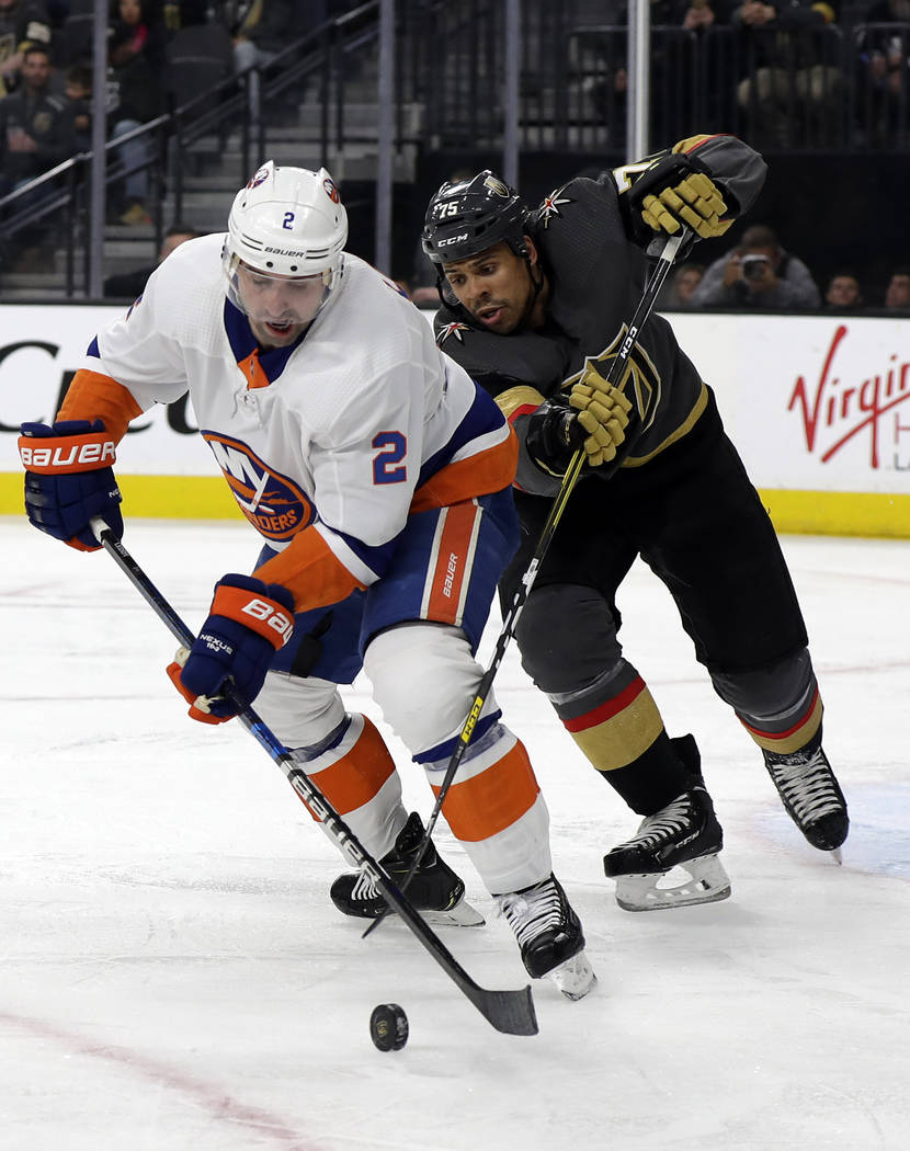 New York Islanders defenseman Nick Leddy (2) and Vegas Golden Knights right wing Ryan Reaves fi ...