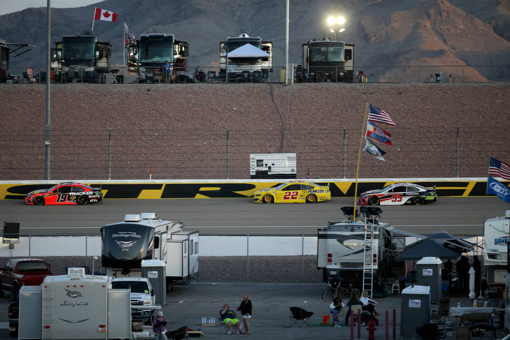 NASCAR Cup Series drivers Martin Truex Jr. (19), Joey Logano (22) and Christoper Bell (95) prac ...