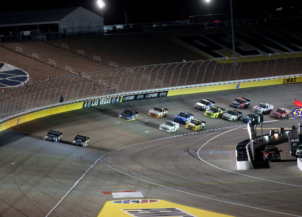 Kyle Busch (51) Christian Eckes (18) battle for the lead during the Strat 200 NASCAR Truck Seri ...