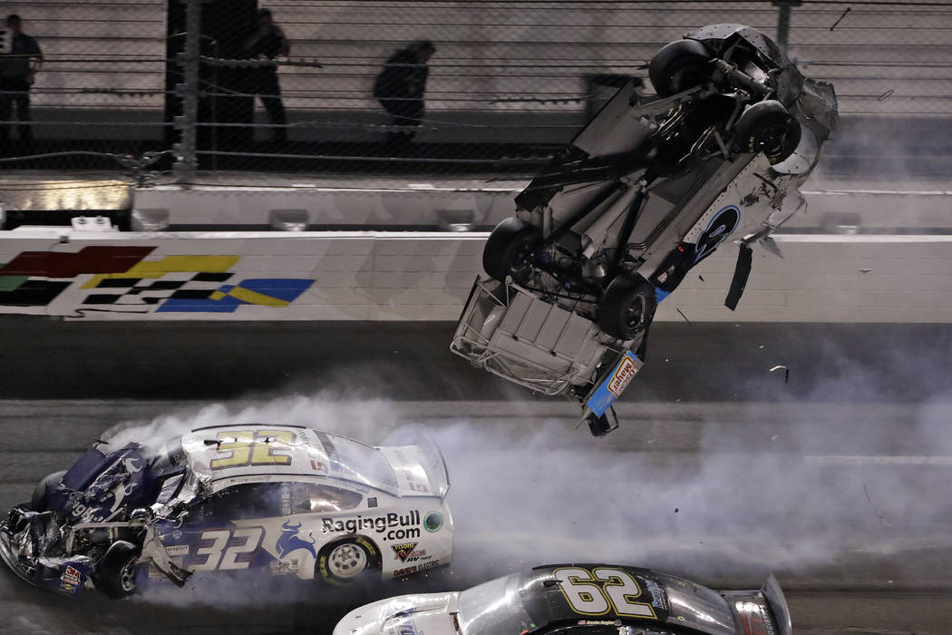 Ryan Newman (6) goes airborne after crashing into Corey LaJoie (32) during the NASCAR Daytona 5 ...