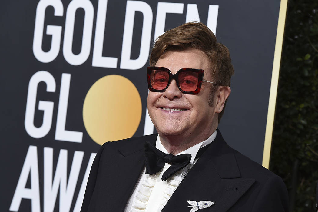 In this Jan. 5, 2020 file photo, Elton John arrives at the 77th annual Golden Globe Awards at t ...