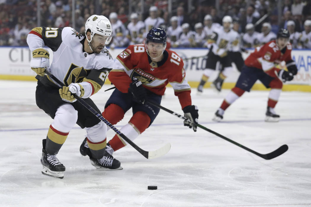Vegas Golden Knights center Chandler Stephenson (20) skates with the puck as Florida Panthers d ...