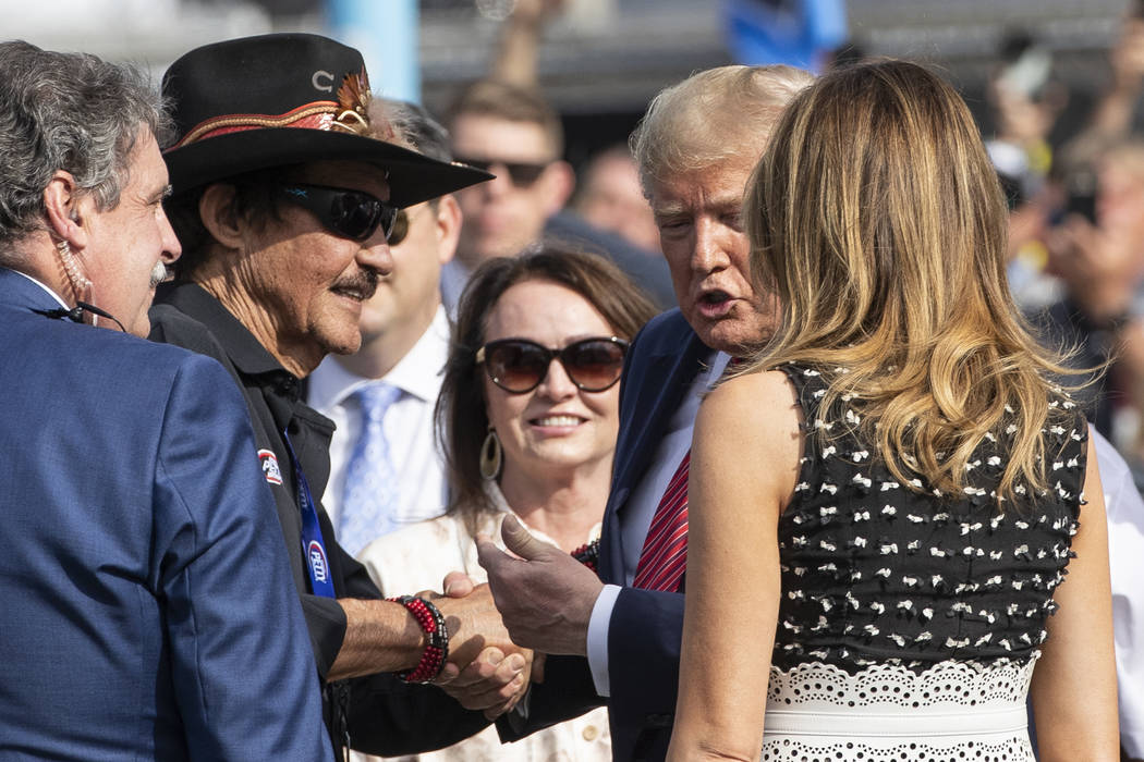 President Donald Trump and first lady Melania Trump greet racing legend Richard Petty, second f ...