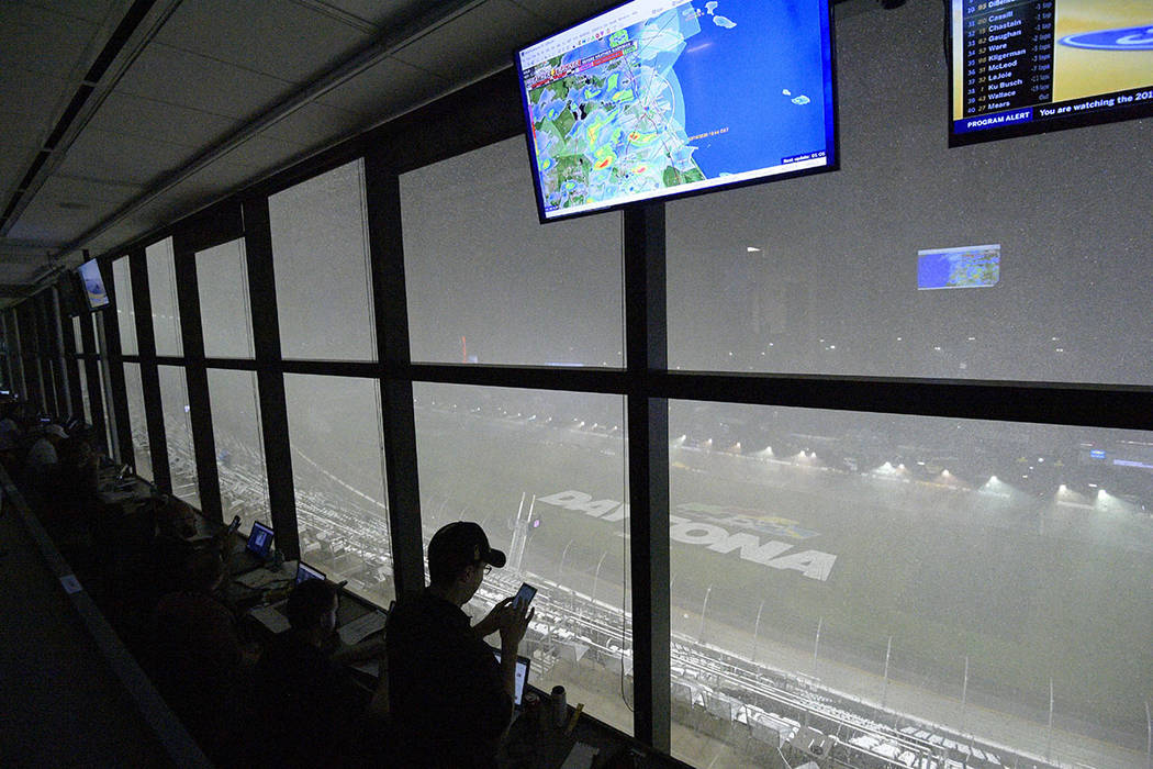 A downpour, as viewed from the press box, forces a postponement of the NASCAR Daytona 500 auto ...
