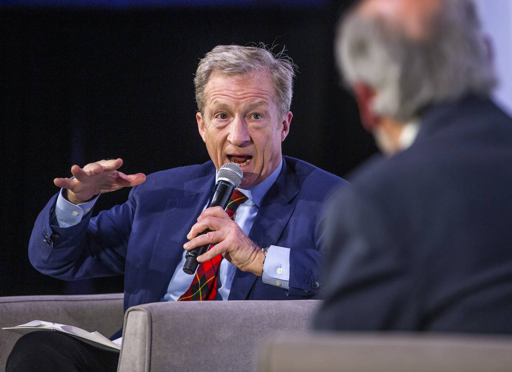 Businessman Tom Steyer, left, answers questions from The Wall Street Journal's Jeanne Cummings ...