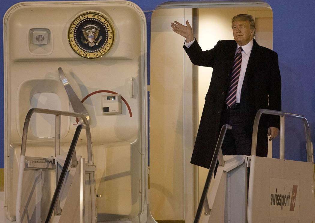 President Donald Trump arrives on Air Force One to McCarran International Airport on Wednesday, ...