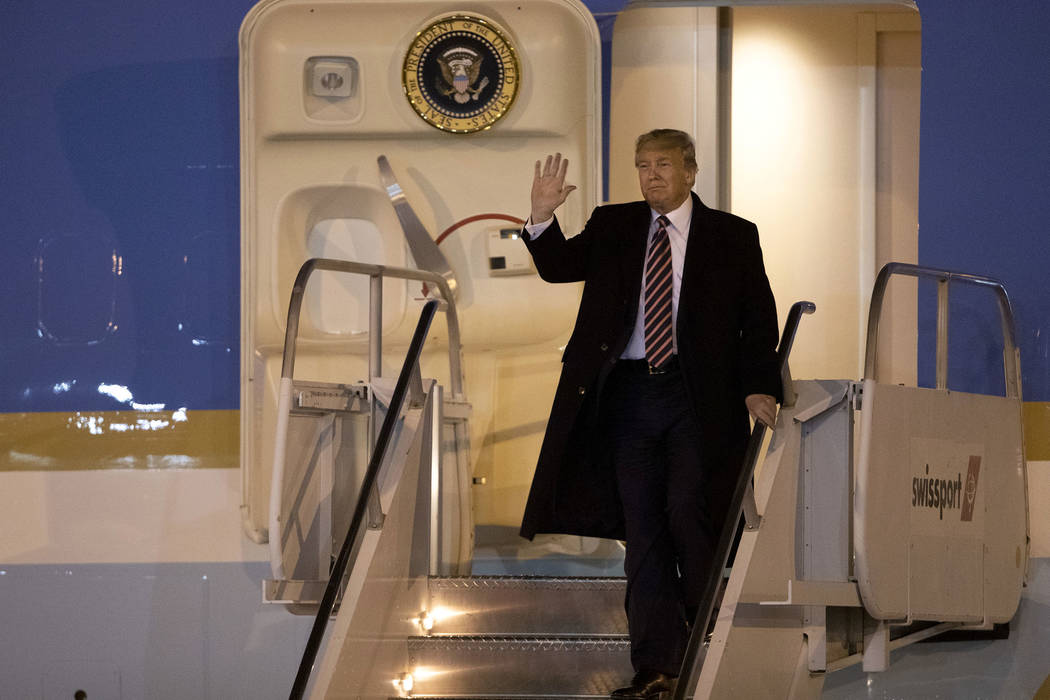 President Donald Trump arrives on Air Force One to McCarran International Airport on Tuesday, F ...