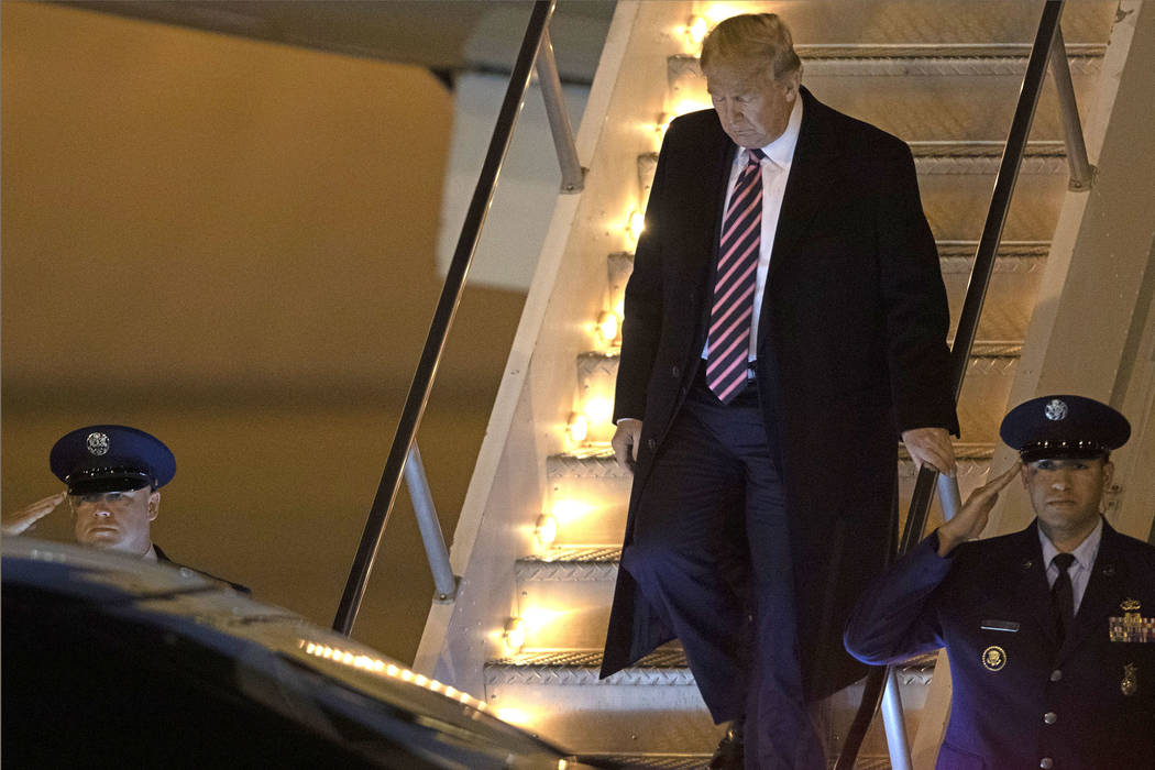 President Donald Trump arrives on Air Force One to McCarran International Airport on Tuesday, F ...