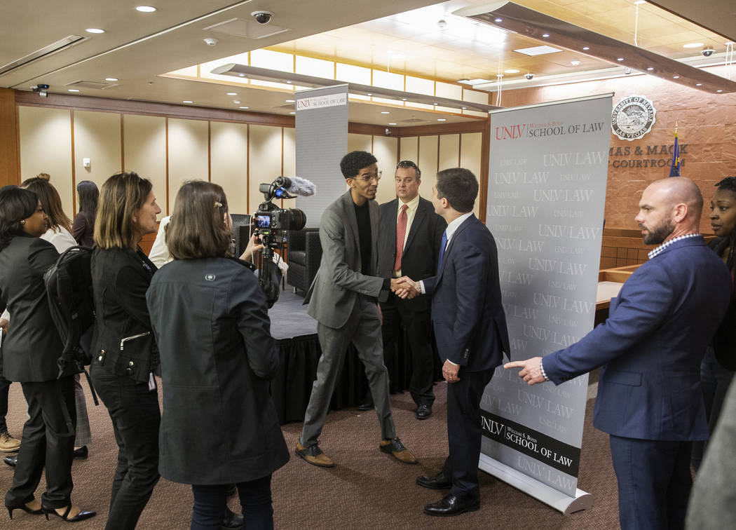 Democratic presidential candidate former South Bend Mayor Pete Buttigieg, third from right, tak ...