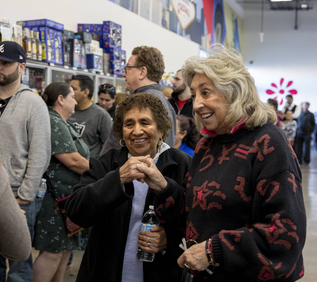 Guadalupe Cantu, 83, of Las Vegas, left, speaks with Rep. Dina Titus, D-Nev., as they wait in ...