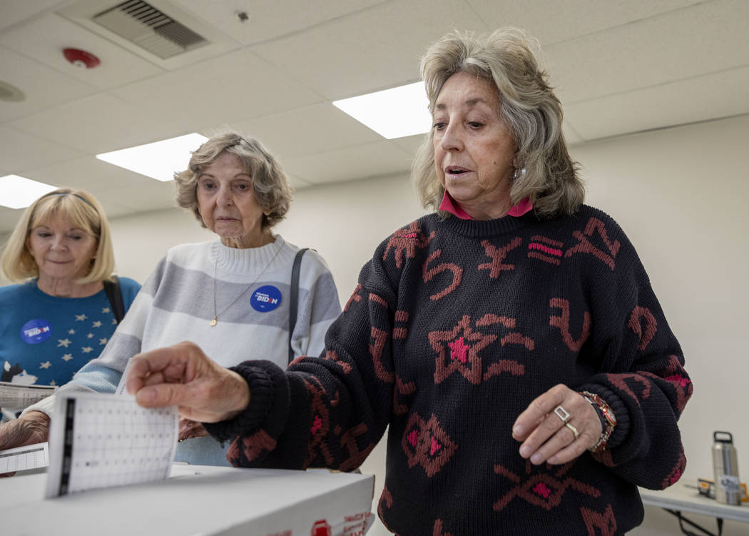 Rho Hudson, left, Betty Titus, center, and Rep. Dina Titus, D-Nev., cast their early vote at Ca ...