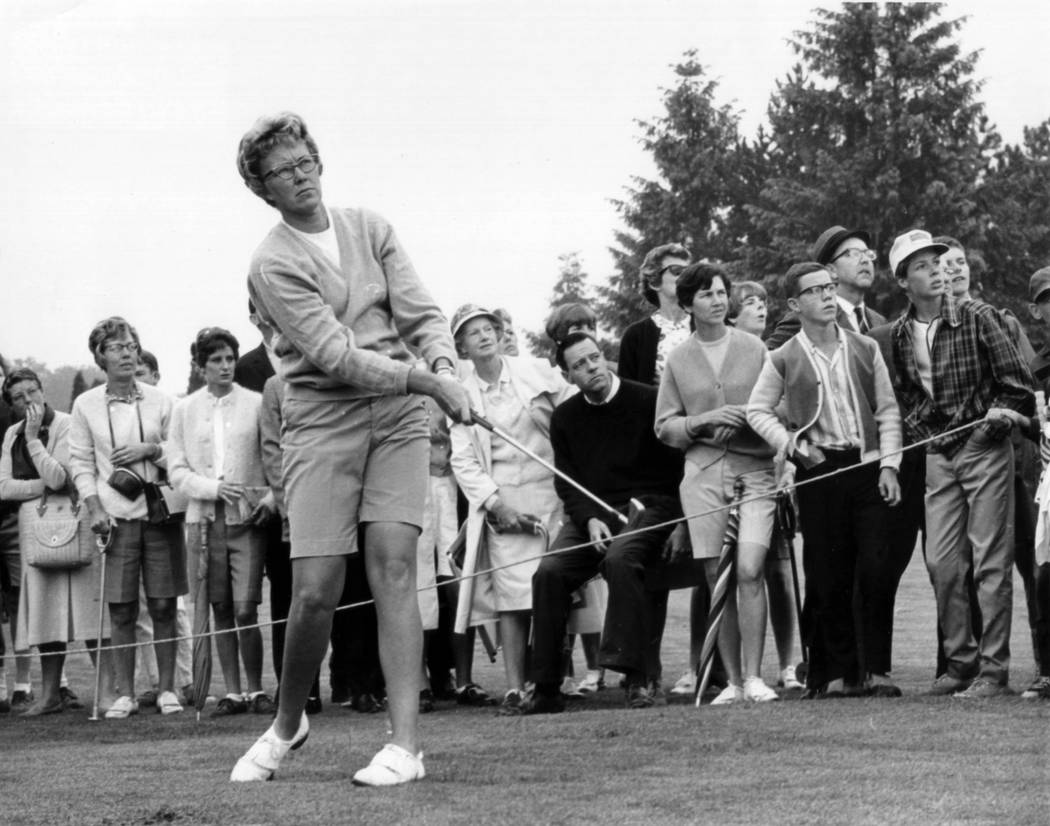 The gallery follows Mickey Wright's iron shot from the fairway at the Toronto Golf Club in 1967 ...