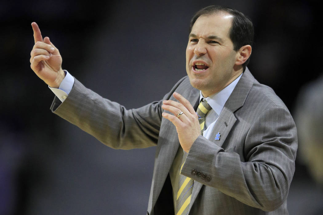 Baylor head coach Scott Drew directs this team during the first half of an NCAA college basketb ...