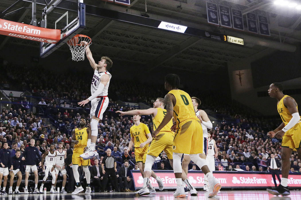Gonzaga forward Corey Kispert (24) dunks during the second half of the team's NCAA college bask ...