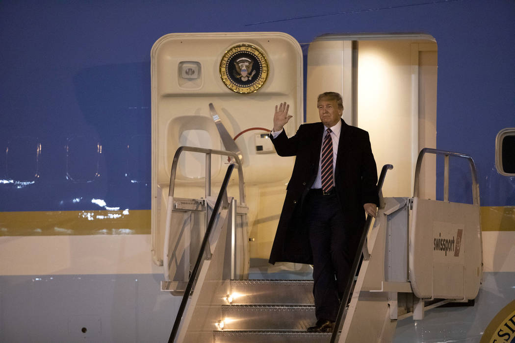 President Donald Trump arrives on Air Force One to McCarran International Airport on Tuesday, F ...