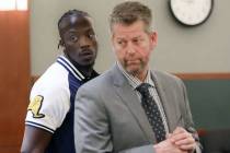 Durwin Allen, left, appears in court to set a new trial date with attorney Peter S. Christianse ...