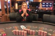 Dorothy Boone of Temple, Texas, is all smiles after she hit a Three Card Poker progressive jack ...