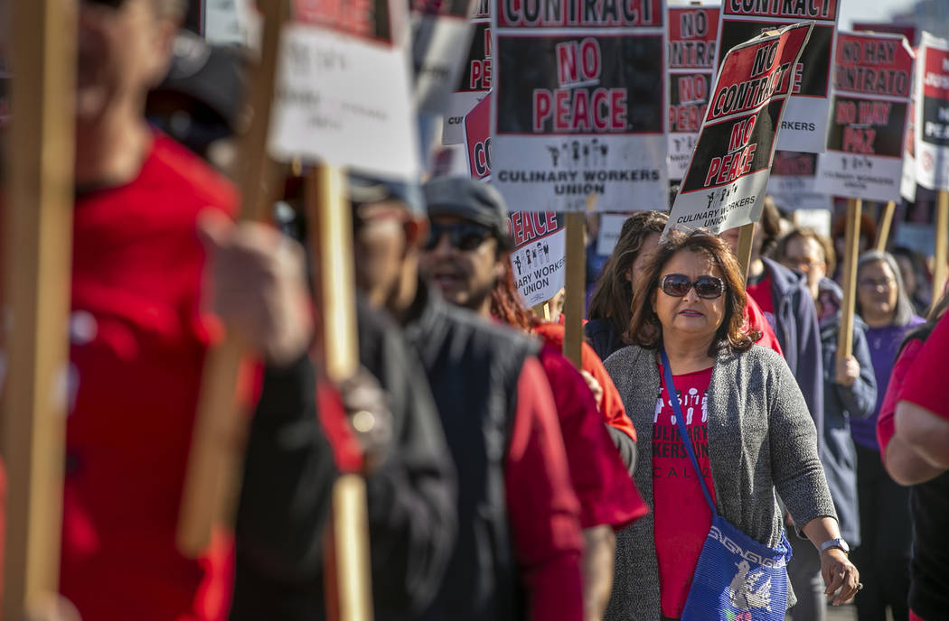Workers from seven Station Casinos' properties walk a picket line while fighting for a union co ...