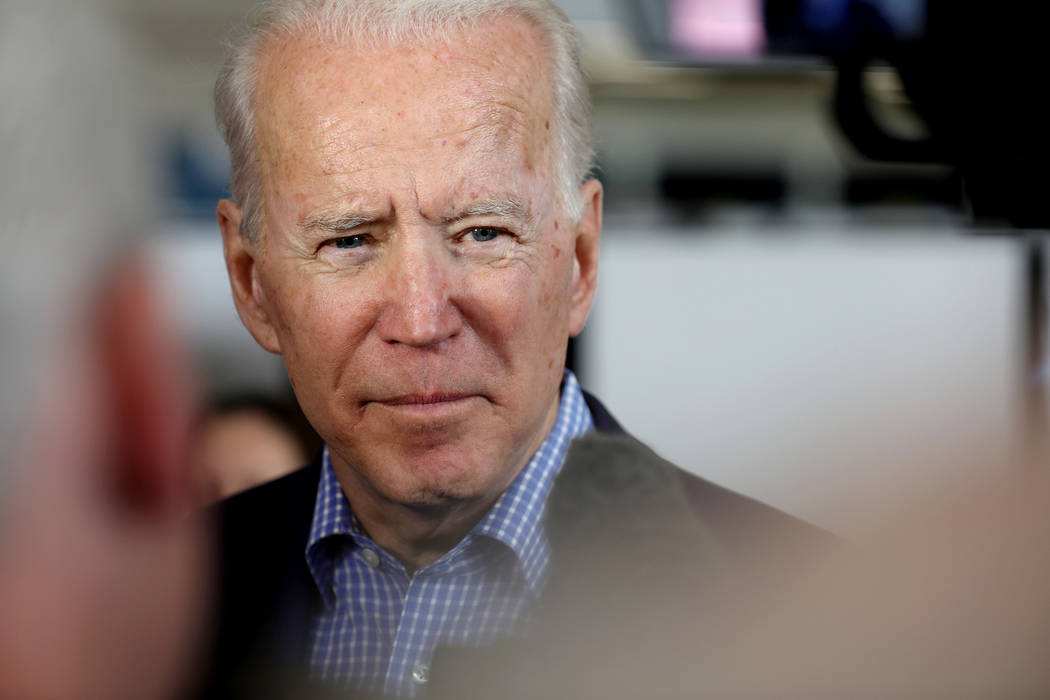 Democratic presidential candidate former Vice President Joe Biden is interviewed before the cau ...