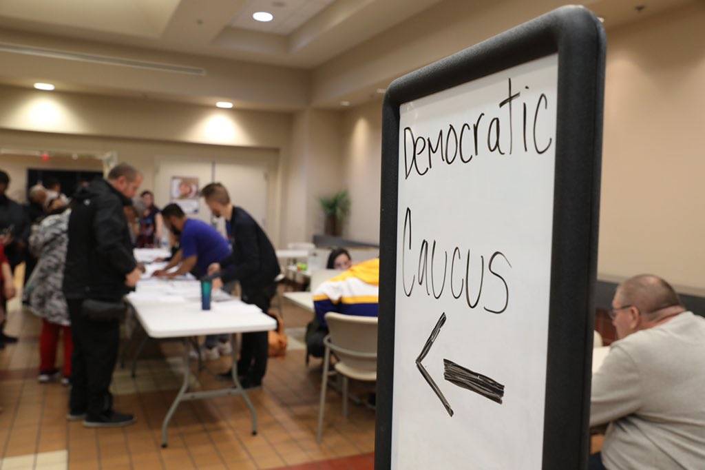 Caucus-goers line up at the East Las Vegas Community Center on Saturday, Feb. 22, 2020, in Las ...