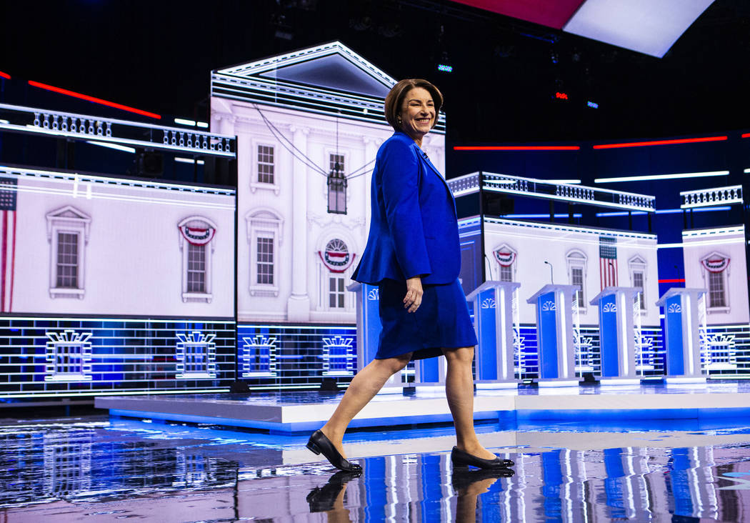 Democratic presidential candidate Sen. Amy Klobuchar, D-Minn., walks on stage before the start ...